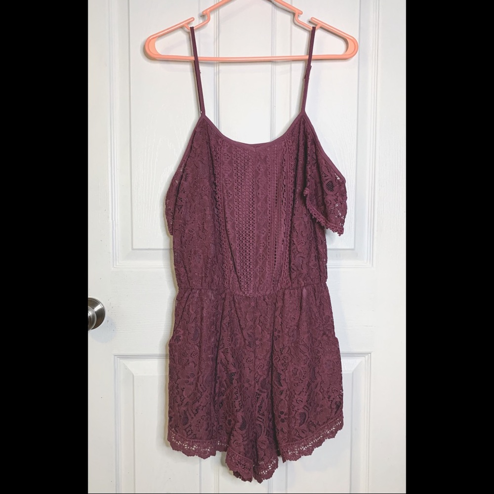 Off the shoulder crochet romper with shorts.